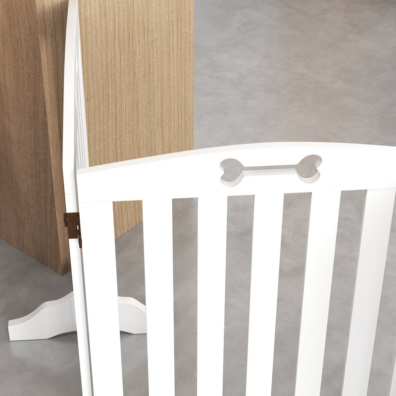 Close-up of a folding hinge and support foot on the dog gate panel