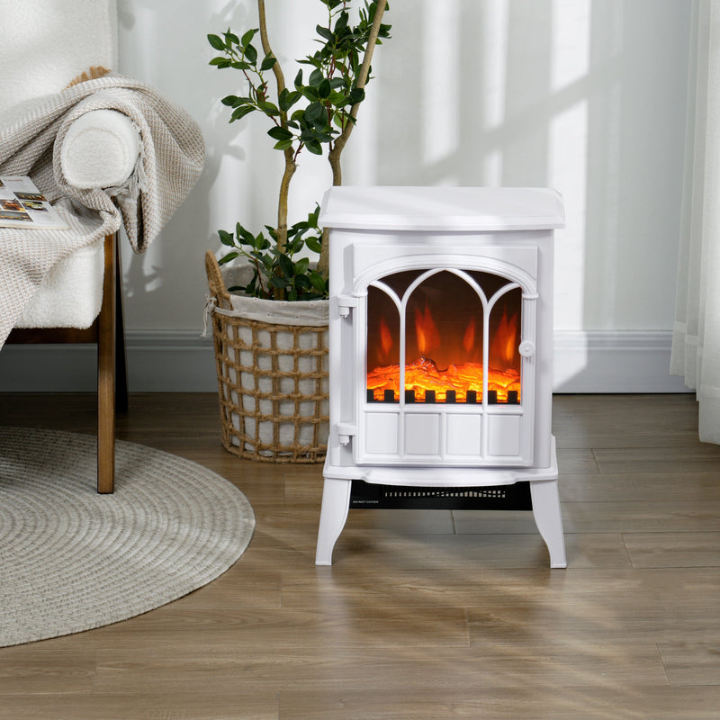 Freestanding fireplace heater on a wooden floor next to a round rug and house plant