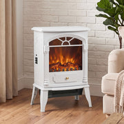 Compact electric stove in a bright room with a brick wall and potted plant