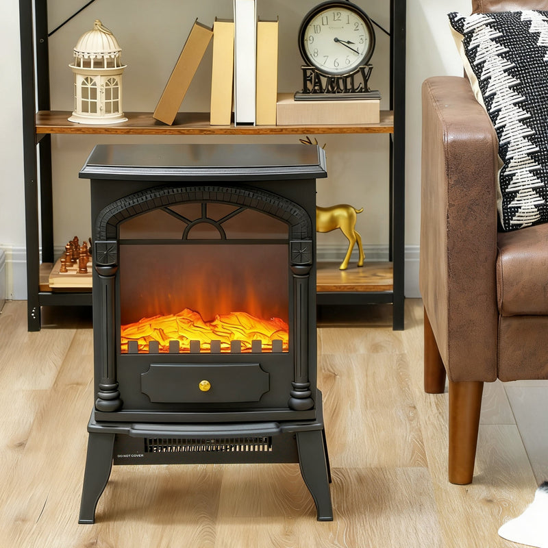 Front view of the stove fireplace in front of a bookshelf between two armchairs