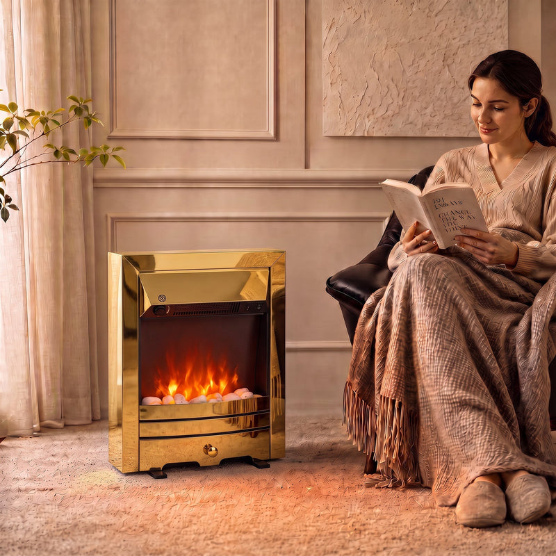 Woman reading in an armchair next to the freestanding fireplace on a rug