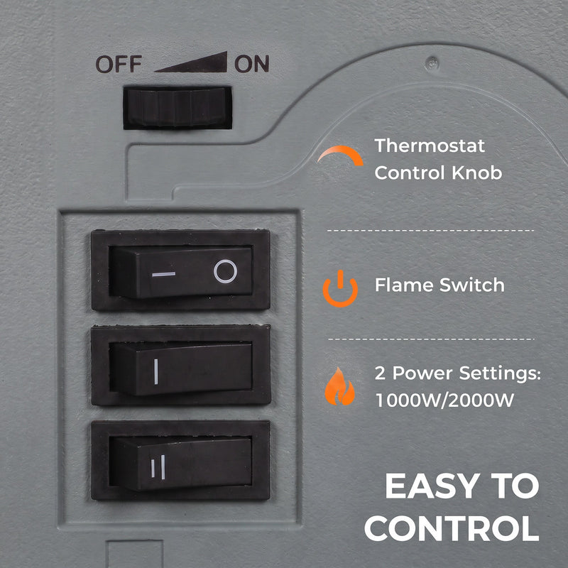 Side control panel on the grey fireplace showing the thermostat knob, flame switch and power switches