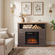Fireplace suite beside a sofa with wall lights and framed prints above