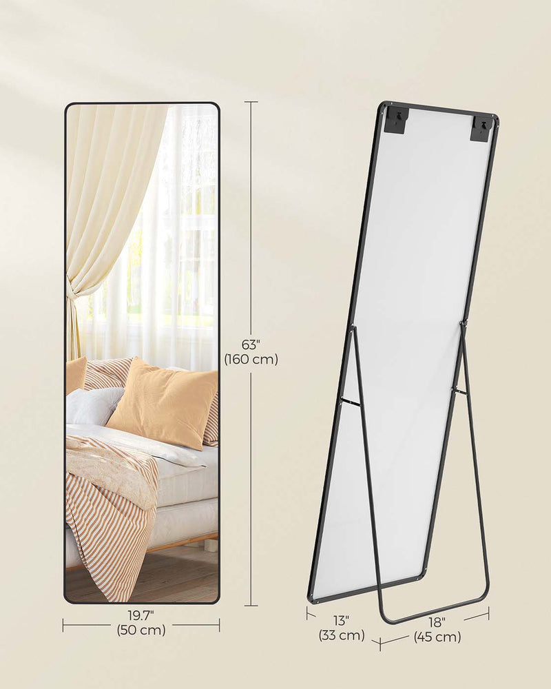 Full length mirror styled in a hallway setting