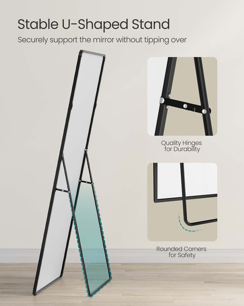 Full-length mirror leaning against a wall in a hallway