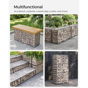 Gabion basket styled as a bench, planter, divider and pillar in a garden