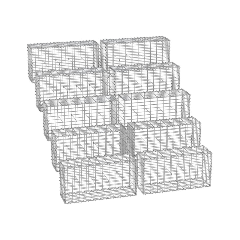 Ten galvanised steel gabion cages stacked and ready for garden wall building