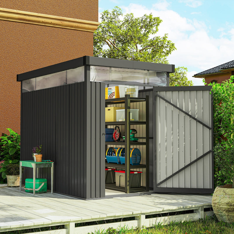 Metal garden shed on decking with the door open showing shelving, tools and storage boxes