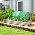 Silver galvanised steel raised garden bed with a plant cover and tomato plants on a lawn