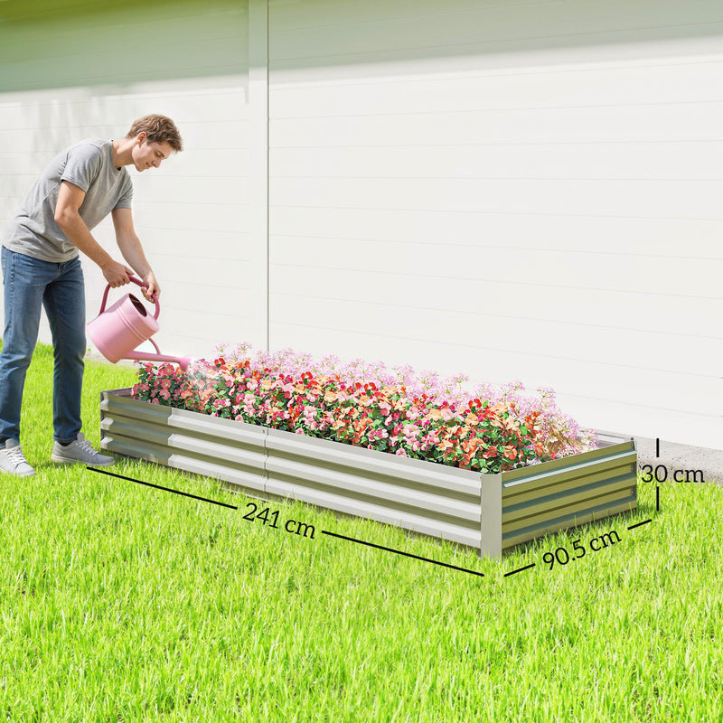 Man watering flowers in the silver raised garden bed, marked 241 cm long, 90.5 cm wide and 30 cm high
