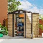 Wood effect 7x4ft Outsunny metal garden shed on decking with both sliding doors open, showing shelves of tools and boxes