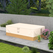 Beige furniture cover over a garden set on a patio beside a stone wall