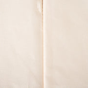 Close-up of the stitched seam in the beige Oxford fabric