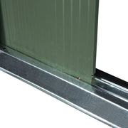 Close-up of a wall panel meeting the galvanised steel base rail