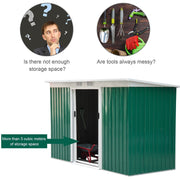 Green shed with the door open and a wheelbarrow stored inside