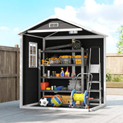 Cutaway view of the black plastic shed holding tools, balls, a hose reel and a ladder