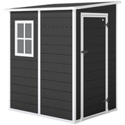 Black lean to plastic garden shed with white trim, a window and a closed door, studio view