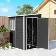 Black lean to shed beside a fence with the door swung open and a step ladder stored inside