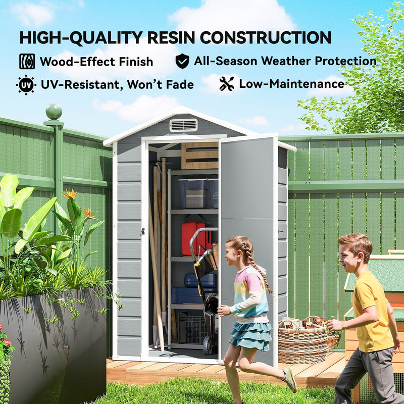 Wood-effect resin shed in a garden with the door open and two children walking past