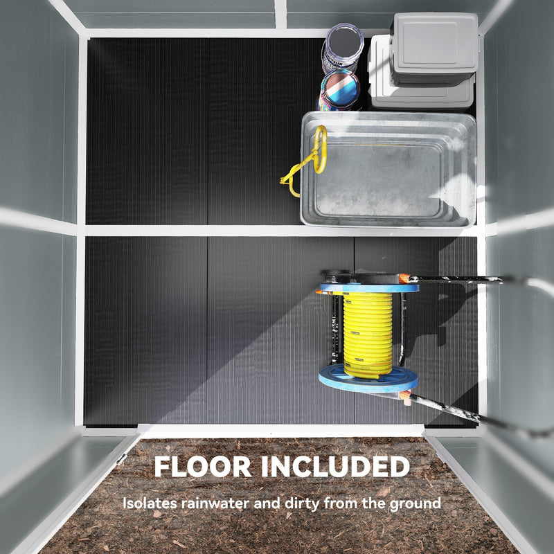 Shed interior with the built-in floor panel highlighted below a hose reel and storage boxes