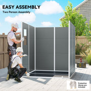 Man slotting the shed's grey wall panels together during a two-person assembly