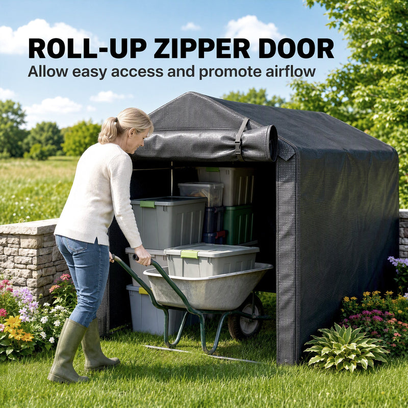Woman wheeling a wheelbarrow of crates into the dark grey tent through the roll-up zipper door