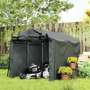 Dark grey storage tent with a lawn mower parked inside beside potted plants