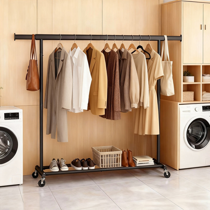 Songmics garment rail with clothes in a laundry room next to a washing machine