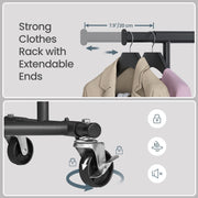 Close-up of extendable rail ends and locking swivel wheels on Songmics garment rail