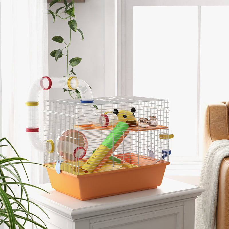 Gerbil cage with connecting tubes placed on furniture in a bright room