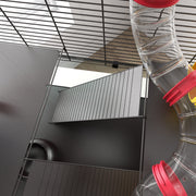 Top-down close-up of the ramp, platform and connecting tube inside the cage
