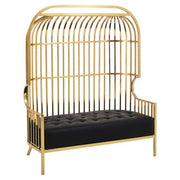 Gold dome cage 2 seater sofa on a plain studio background
