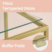 Close-up of the tempered glass shelf and buffer pad on the gold console table