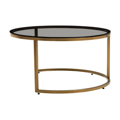 Gold and glass round nesting coffee tables studio shot, separated