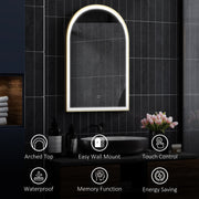 Arched mirror on a dark tiled wall with icons for arched top, easy wall mount, touch control, waterproof, memory and energy saving