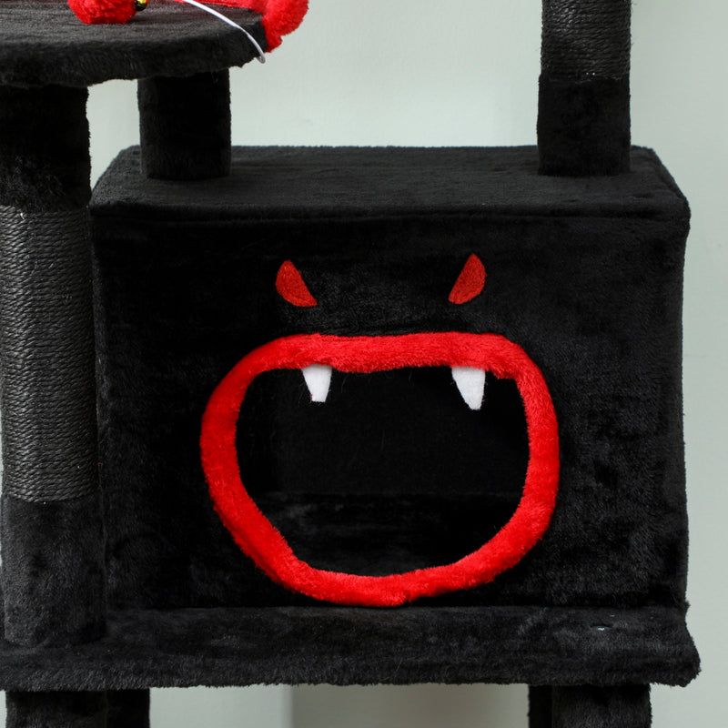 Close-up of the black cat house panel with a red monster face design
