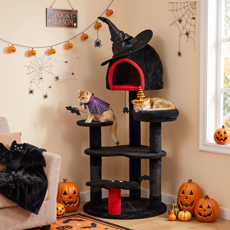 Two cats in Halloween costumes on the Gothic cat tree beside a Spooky Season sign
