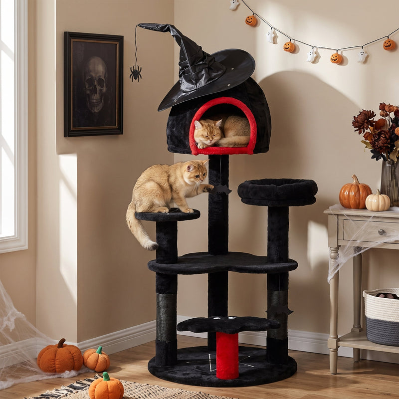 Cat resting inside the witch hat den while another cat plays on a lower platform