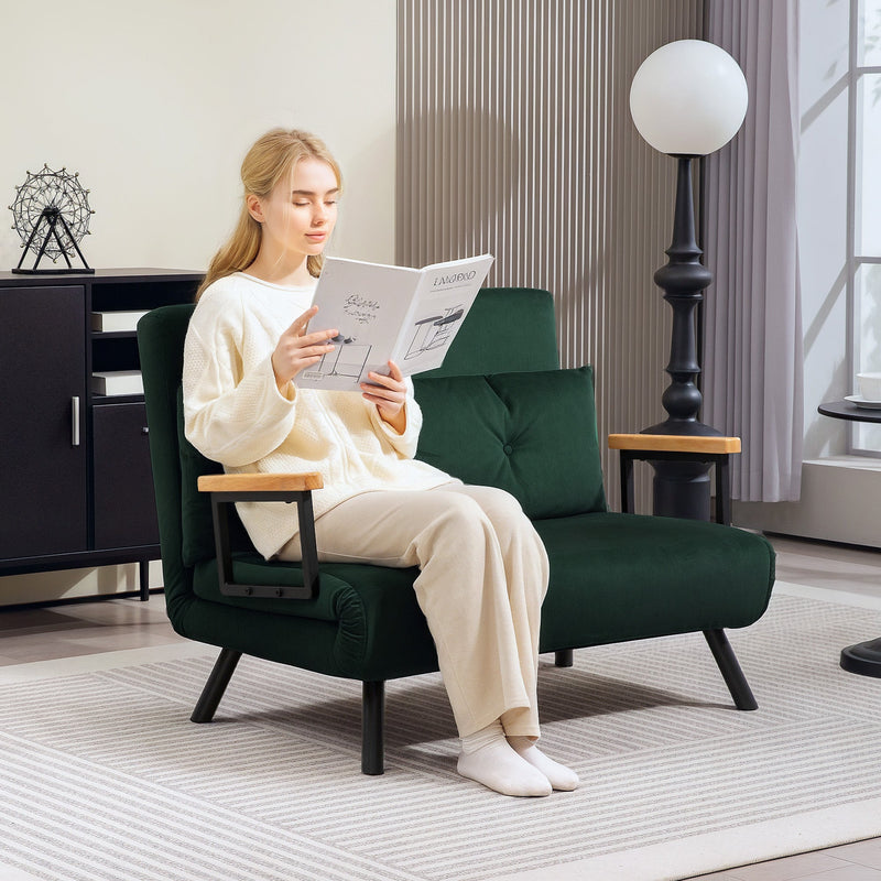 Woman reading in the green sofa reclined in the lounge configuration