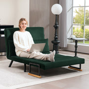 Woman using a laptop in the floor-sofa lounge configuration