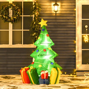 Inflatable Christmas tree beside a porch window with a wreath