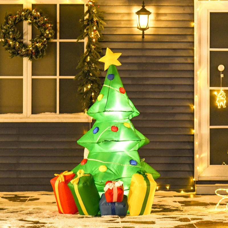 Inflatable Christmas tree beside a porch window with a wreath