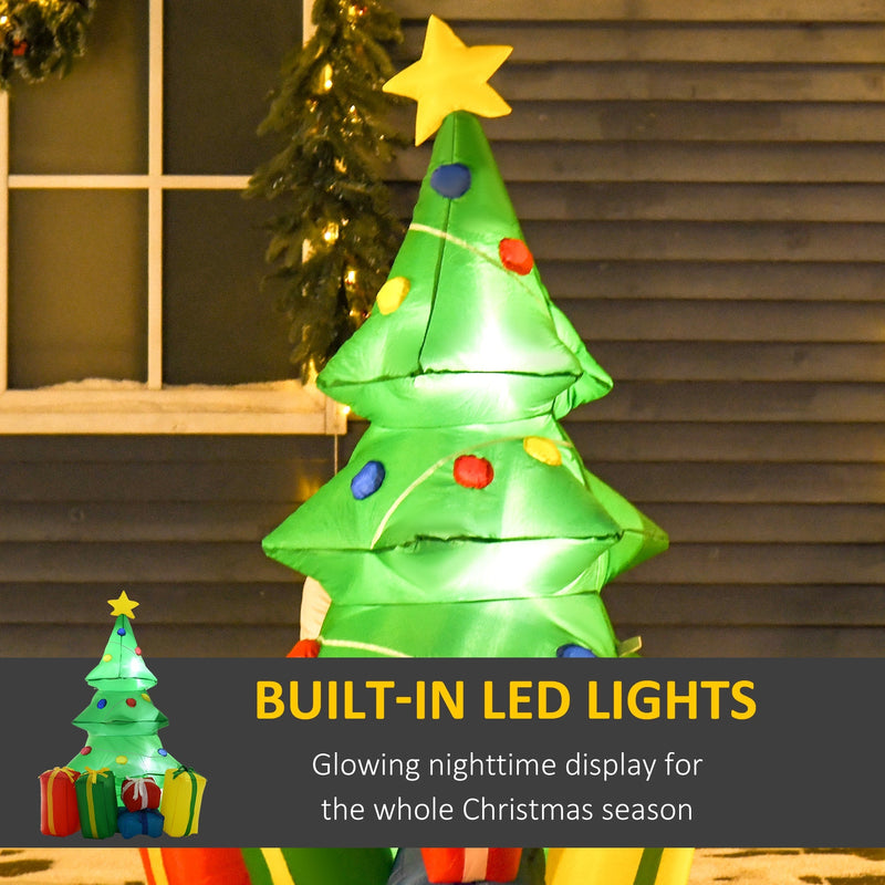Inflatable Christmas tree by a lit window with built-in LED lights label