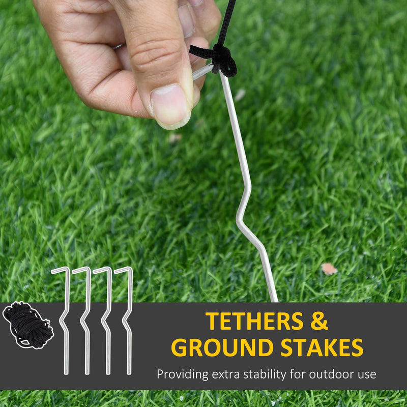 Hand tying a tether rope to a ground stake with tethers and 4 ground stakes label