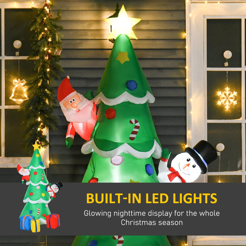 Glowing inflatable tree at night with built-in LED lights callout