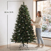 6ft Christmas tree next to a woman with size labels showing 1.8 m height and 1.08 m width