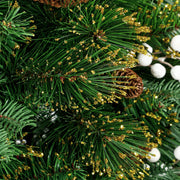 Macro close-up of pine needles with golden tips, white berries and a pine cone on the 6ft tree