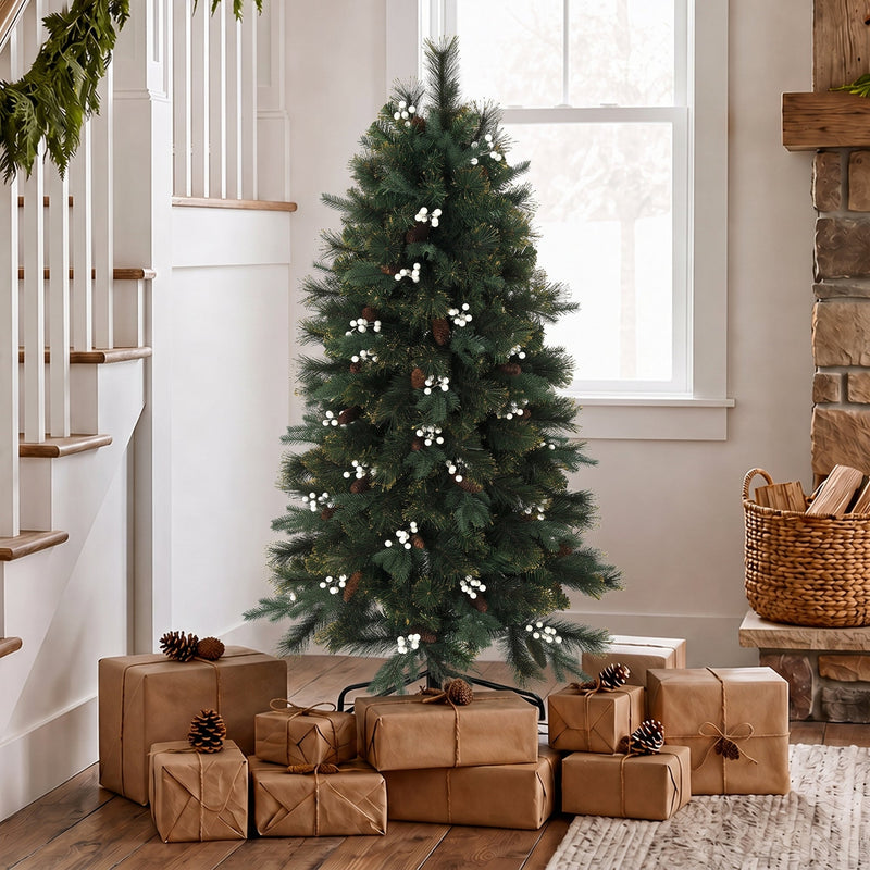 5ft berry Christmas tree by a staircase with brown paper wrapped gifts and pine cones at its base