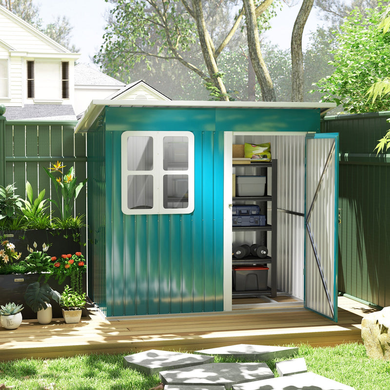 Green 7x4ft metal garden shed in a planted garden with the door open, showing shelves of tools and boxes inside
