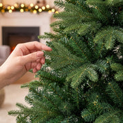 Hand touching the realistic PE and PVC branch tips in a close-up